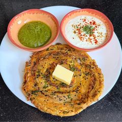 A picture of Restaurant style Paneer Onion 🧅 Lachcha Paratha 🫓.