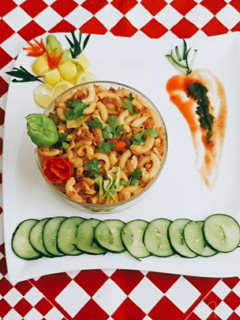 A picture of Chicken Tikka Macaroni.