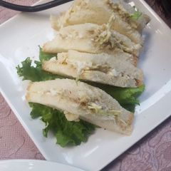 A picture of Egg and chicken sandwich.