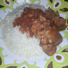 A picture of White rice and pomp stew.