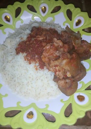 A picture of White rice and pomp stew.