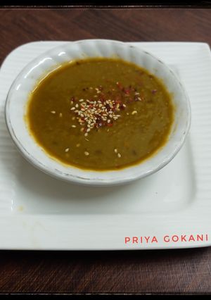 A picture of Palak, Tomato, Sweet Corn and Carrot Soup.