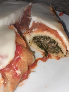 Una foto de Canelones de espinaca y carne picada