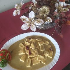 A picture of Shahi Nawabi paneer white gravy restaurant style.