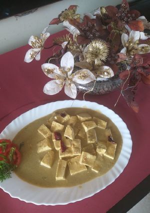 A picture of Shahi Nawabi paneer white gravy restaurant style.
