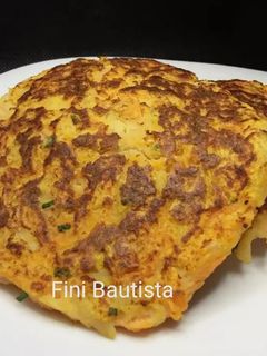 Una foto de Rosti de patata zanahoria y cebolla