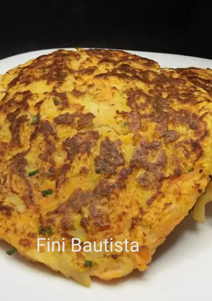 Una foto de Rosti de patata zanahoria y cebolla