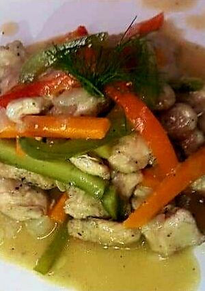 Una foto de Pollo al vino