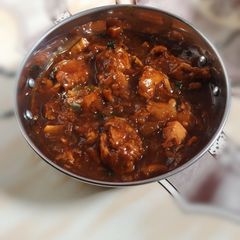 A picture of Yogurt Red Chicken masala Gravy.