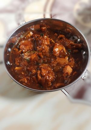A picture of Yogurt Red Chicken masala Gravy.