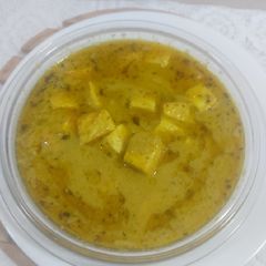 A picture of Paneer green peas white gravy.