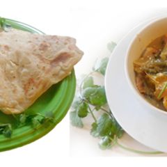 A picture of Ghee Parotta with potato masala curry.