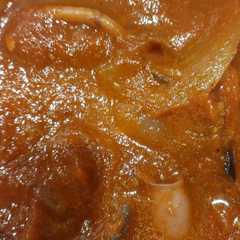 Una foto de Pota con tomate