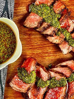 A picture of Grilled Wagyu Filet Mignon with Charmoula Sauce.