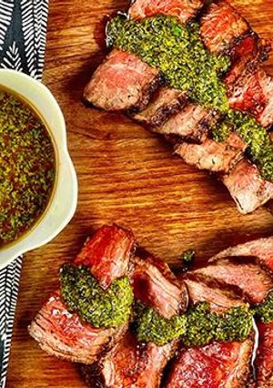 A picture of Grilled Wagyu Filet Mignon with Charmoula Sauce.