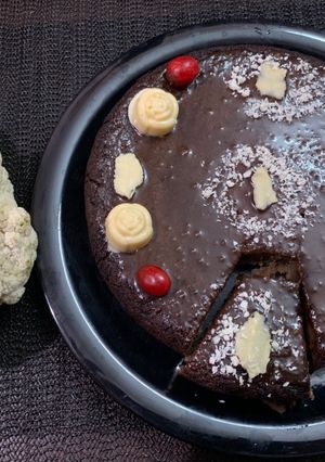 A picture of Cauliflower chocolate cake with chocolate leaves.