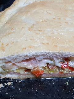 Una foto de Calzone de jamón y queso