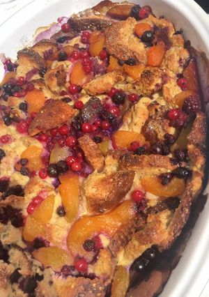 Une photo de Pudding aux pêches et fruits rouges