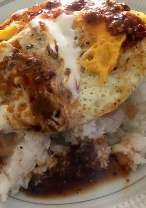 A picture of White Rice with Fried Egg 🍳.