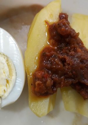 A picture of Irish potato with boiled egg.