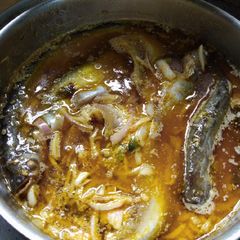 A picture of Steamed Pabda with mustard paste.