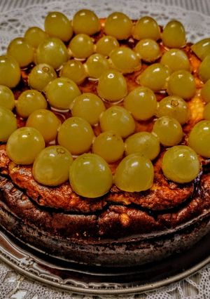 Una foto de Tarta de queso y uvas