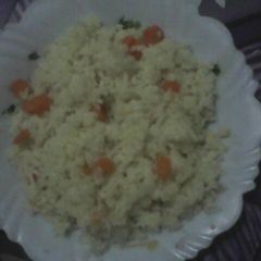 A picture of Plain rice with carrots.