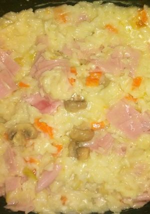 Una foto de Risotto al vino blanco con champignon  y jamón