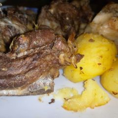 A picture of Fried beef in oven.