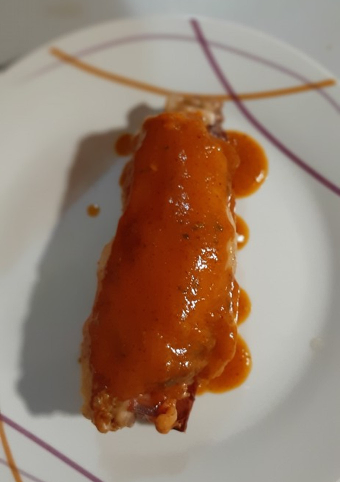 Una foto de Pollo relleno con salsa de verduras
