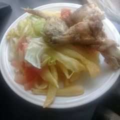 A picture of Chips and salad.