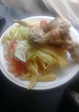 A picture of Chips and salad.