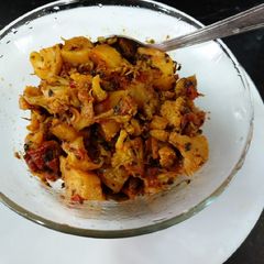 A picture of Cauliflower with fenugreek leaves.