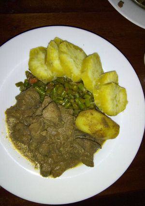 A picture of Chicken liver, stir fried French beans and boiled sweet potatoes.