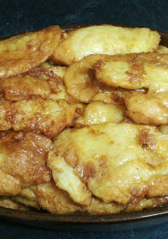 Una foto de Torrijas de leche con almíbar de naranja