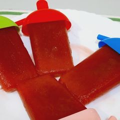 A picture of Strawberry popsicles.