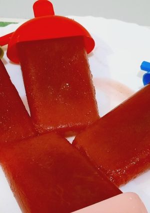 A picture of Strawberry popsicles.