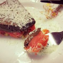 A picture of Orange cake with chocolate mousse.