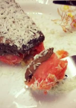 A picture of Orange cake with chocolate mousse.