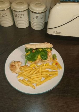 A picture of Paprika chicken burgers with sweetcorn relish.