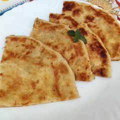 Peri Peri Chëësy Paratha 🫓🫓 A picture of Peri Peri Chëësy Paratha 🫓🫓.