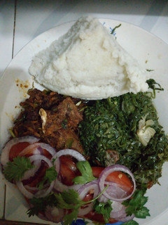 A picture of Ugali with# beef challege#fryand kales.