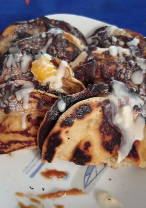 Una foto de Panqueques rellenos con dulce de leche