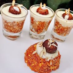 A picture of Gazar Ka halwa with Rabadi and gulab jamun.