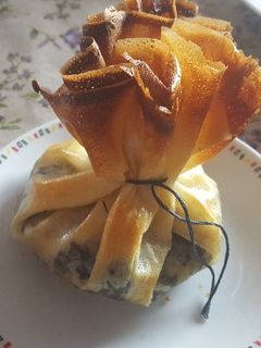 Una foto de Saquito de morcilla y manzana