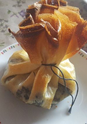A picture of Blood Sausage and Apple Phyllo Pouches.