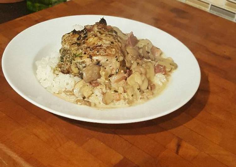 Roast Chicken Thighs in a Sautéed Mushroom Parmasan Garlic Cream Roast Chicken Thighs in a Sautéed Mushroom Parmasan Garlic Cream
