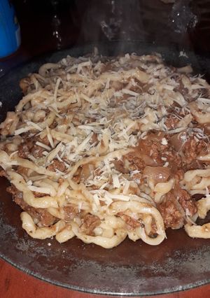 Una foto de Tallarines con salsa