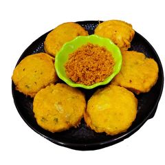 A picture of Potato And Lotus steam Tikki.