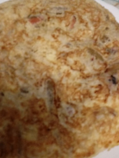 Una foto de Tortilla de borraja y tacos de pulpo